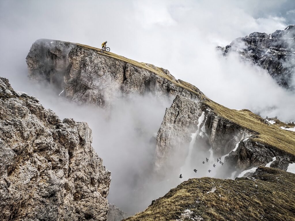 mountains, fog, mountain biking, cliffs, biking, mtb, bike, bicycle, extreme sport, sport, cycling, cyclist, man, dolomites, adventure, risk, nature, reckless, foggy, adrenaline, courage